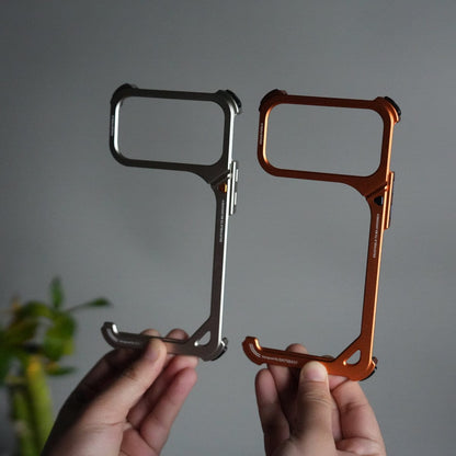 iPhone 17 Pro 9-Shaped Frameless Metal Bumper Case with Hidden Lens Stand | Shockproof Aviation-Grade Alloy Frame