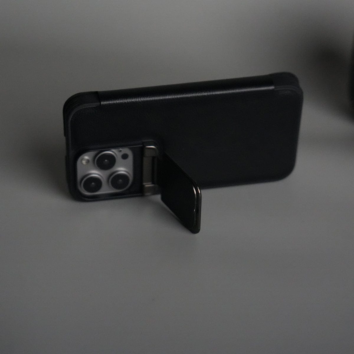 iPhone 15 Series Flip Case With Metal Camera Stand