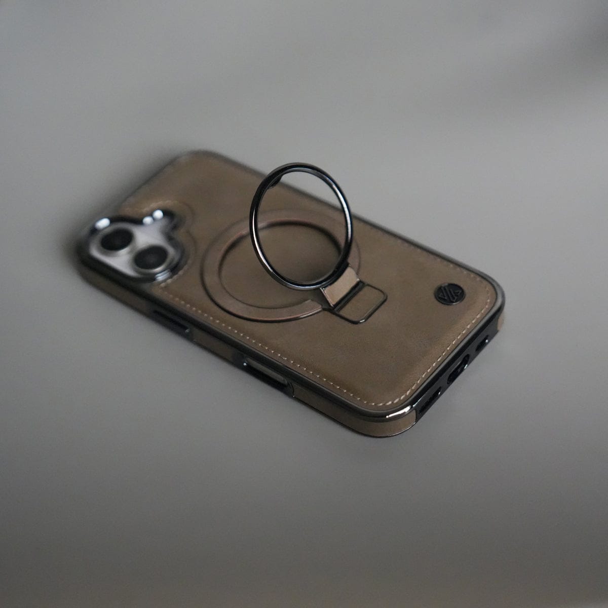 iPhone 17 PU Leather Chrome Side Case With Ring Metal Stand